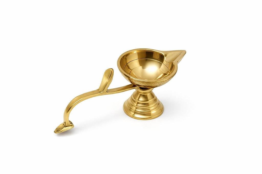 PeetalKraft small brass diya with handle, ideal for home temple and spiritual puja, featuring a polished finish and intricate detailing.
